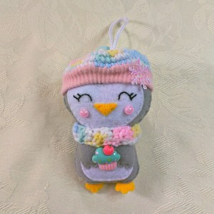 grey white penguin christmas tree decoration