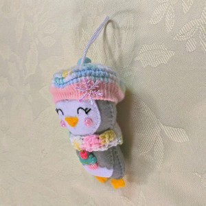 grey white penguin christmas tree decoration