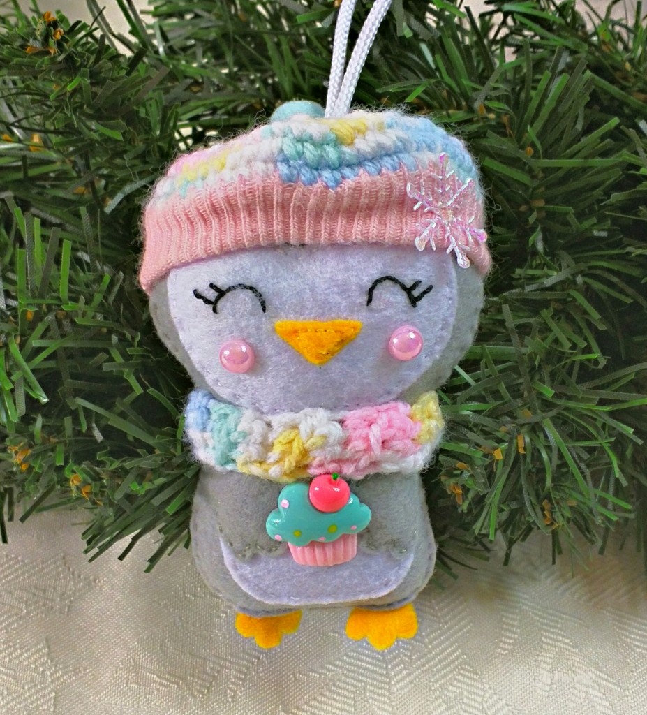 grey white penguin christmas tree decoration