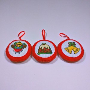 three red round chistmas tree ornaments